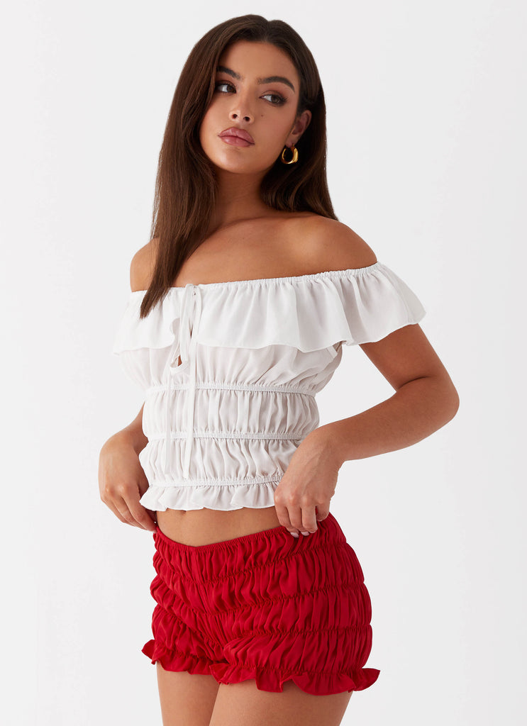 Womens Girls Like Us Ruched Mini Shorts in the colour Red in front of a light grey background