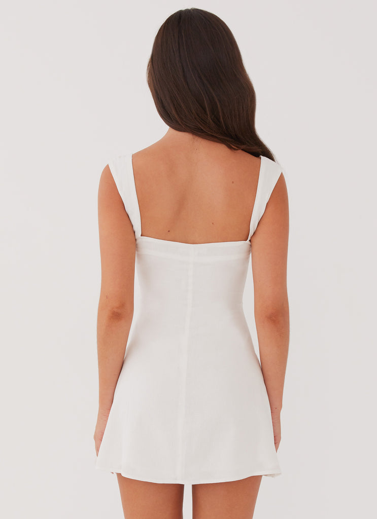 Womens Cadence Mini Dress in the colour White in front of a light grey background