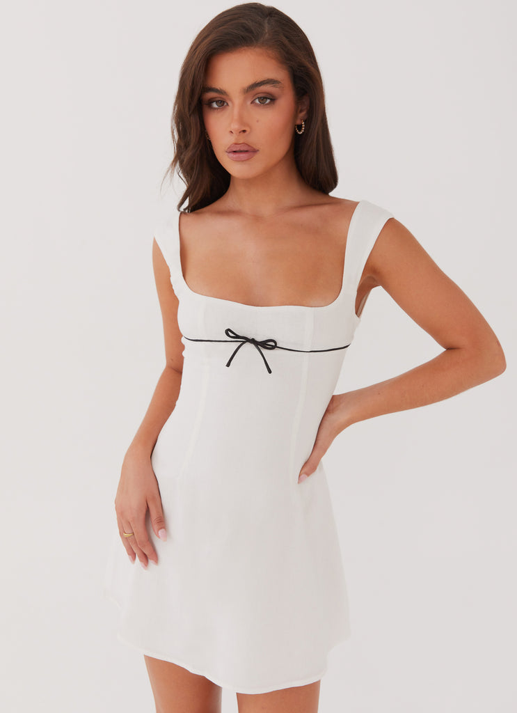 Womens Cadence Mini Dress in the colour White in front of a light grey background