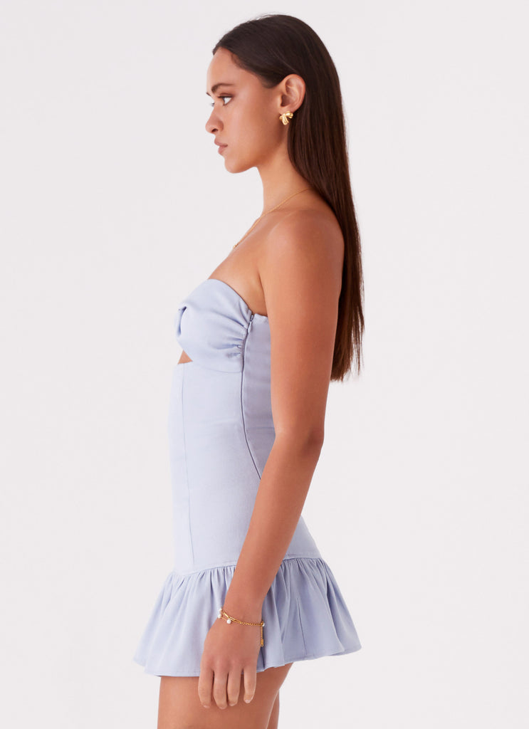 Womens Gigi Frill Mini Dress in the colour Blue in front of a light grey background